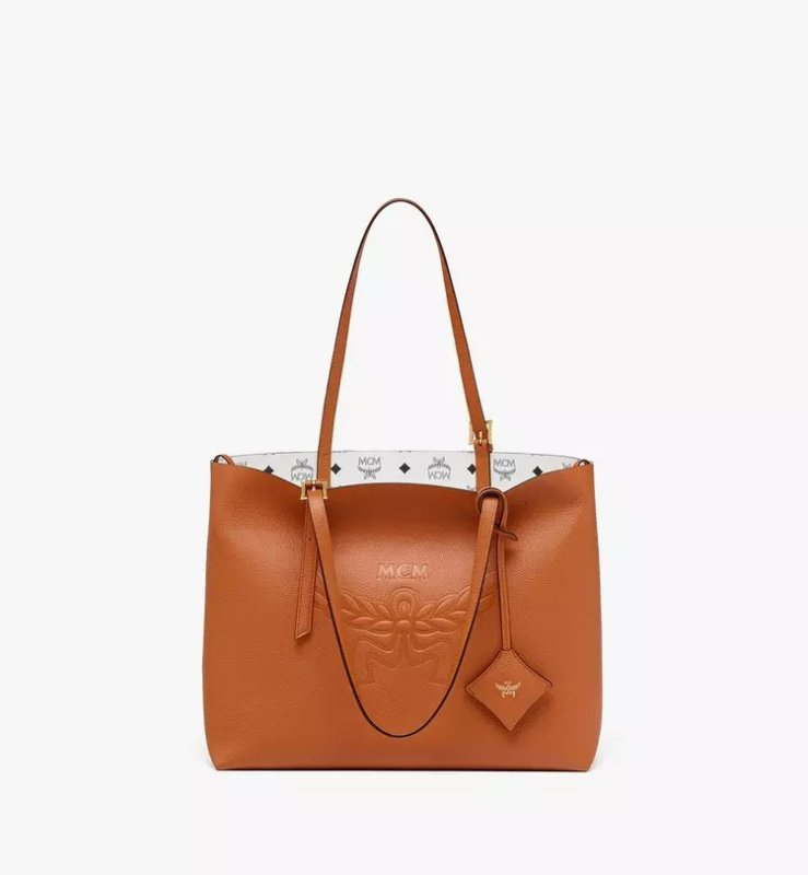 MCM HIMMEL SHOPPER IN EMBOSSED LOGO LEATHER - COGNAC
