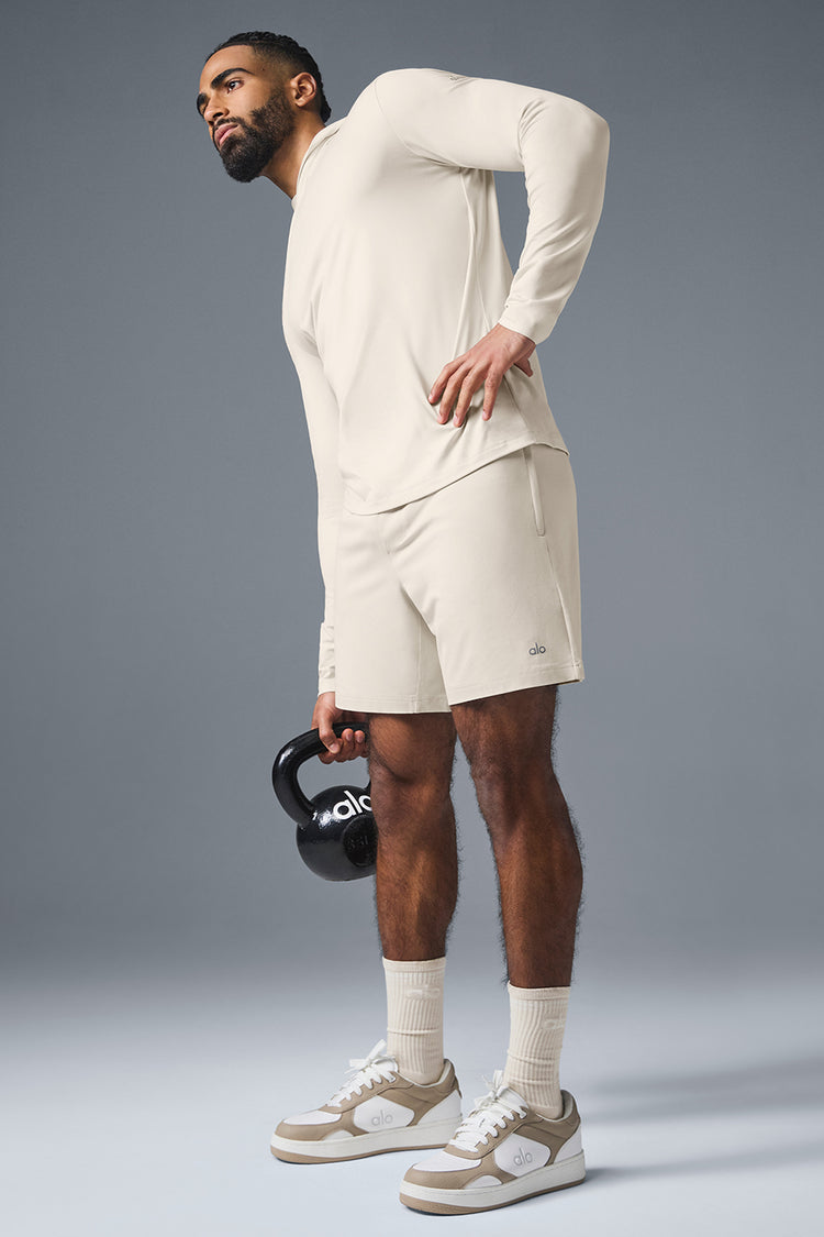 ALO YOGA CONQUER REFORM LONG SLEEVE WITH HOOD - BONE