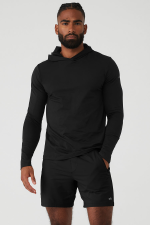 ALO YOGA CONQUER REFORM LONG SLEEVE WITH HOOD - BLACK