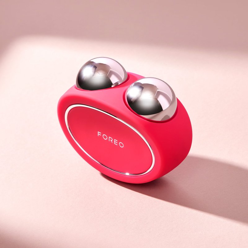 FOREO BEAR FACIAL TONING DEVICE IN FUCHSIA COLOR FOR SKIN TONING AND LIFTING