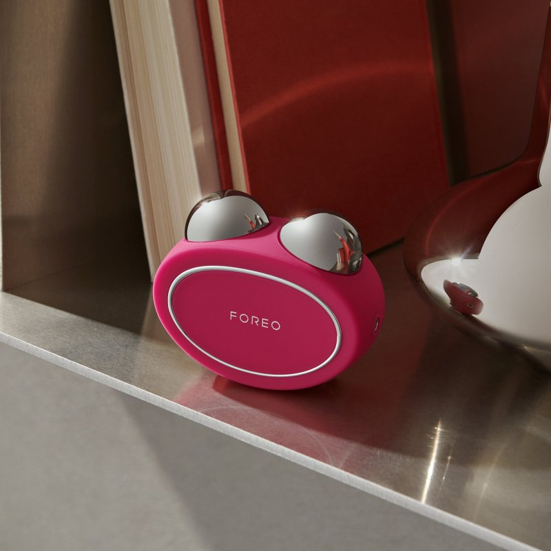 FOREO BEAR FACIAL TONING DEVICE IN FUCHSIA COLOR FOR SKIN TONING AND LIFTING