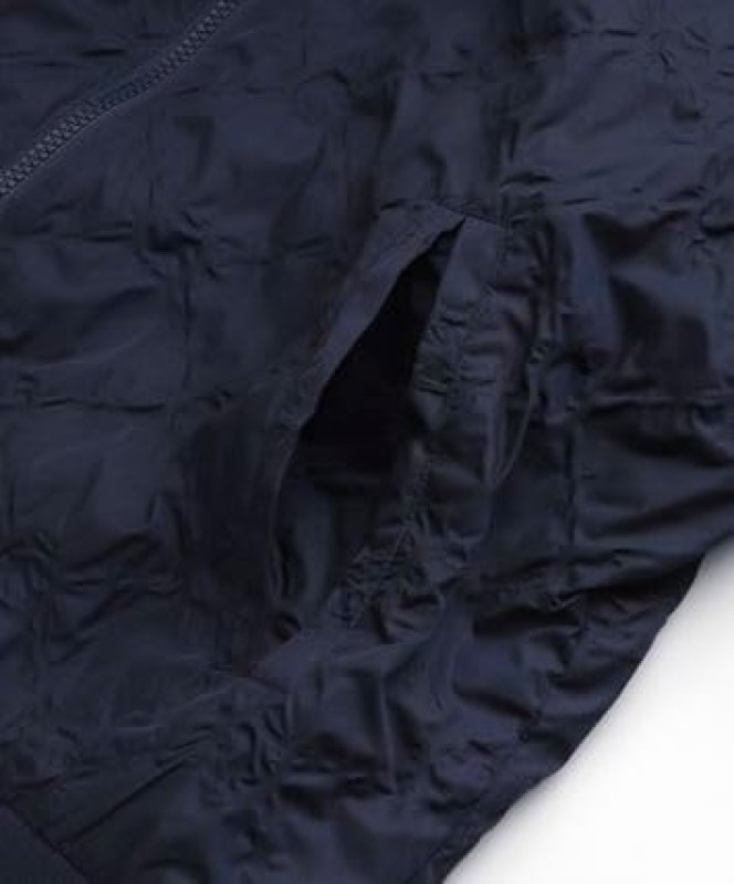 G/FORE WOMEN'S NAVY BLUE TEXTURED BOMBER JACKET IN SMALL SIZE