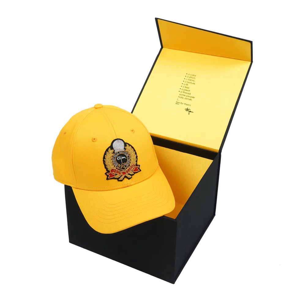 BIJAN YELLOW WITH GOLD CREST CAP