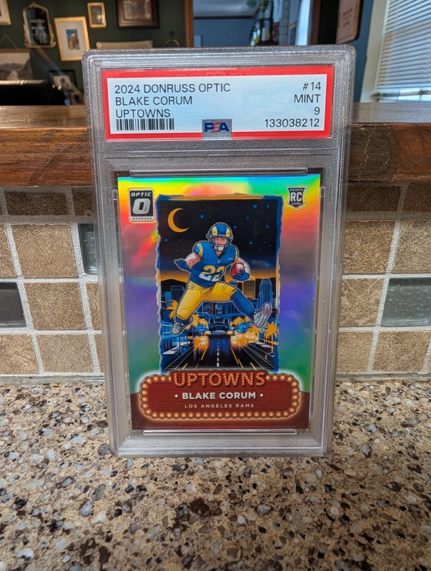 DONRUSS OPTIC UPTOWNS BLAKE CORUM RC ROOKIE #14 PSA 9 PANINI 2024