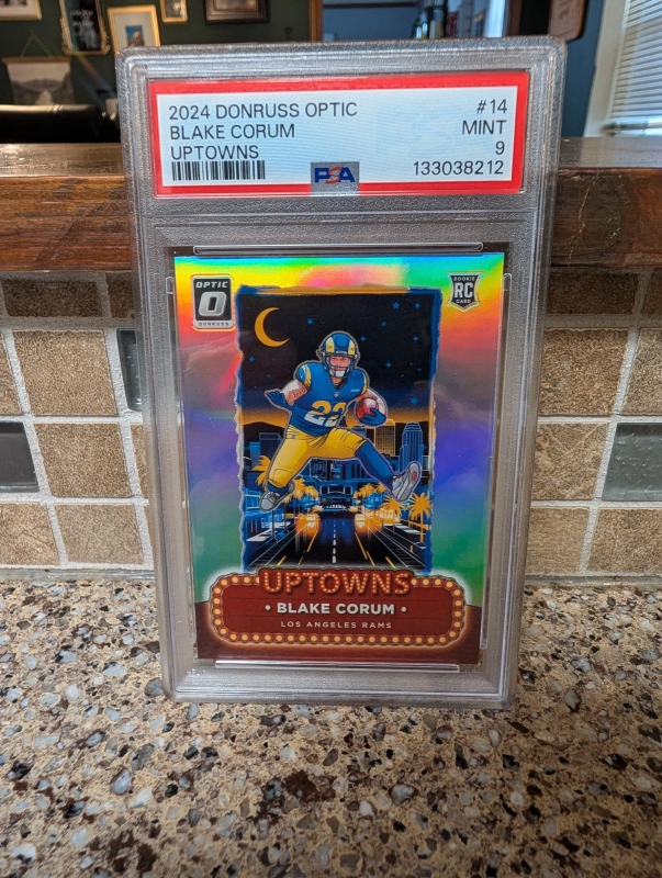 DONRUSS OPTIC UPTOWNS BLAKE CORUM RC ROOKIE #14 PSA 9 PANINI 2024
