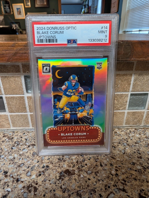 DONRUSS OPTIC UPTOWNS BLAKE CORUM RC ROOKIE #14 PSA 9 PANINI 2024