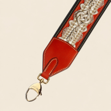 JOSEPH DUCLOS DIDEROT PASSEMENTERIE STRAP IN COQUELICOT HéRITAGE LEATHER COQUELICOT & BLACK, GOLD BRASS