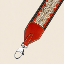 JOSEPH DUCLOS DIDEROT PASSEMENTERIE STRAP IN COQUELICOT HéRITAGE LEATHER PALLADIUM PLATED BRASS COQUELICOT & BLACK,