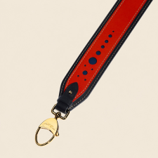 JOSEPH DUCLOS PERFORATED LEATHER STRAP IN COQUELICOT MEZZO LEATHER COQUELICOT & BLACK, PALLADIUM PLATED BRASS