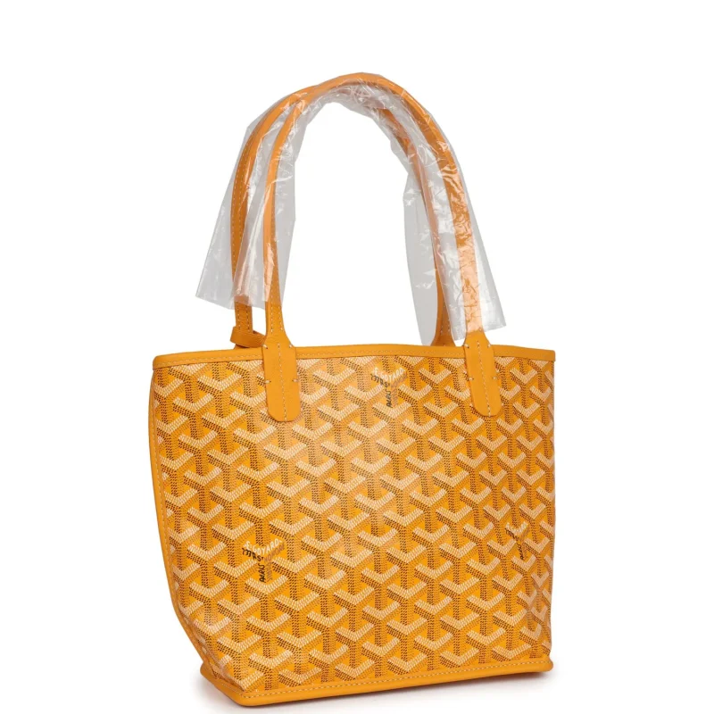 GOYARD GOYARDINE YELLOW ANJOU MINI BAG PALLADIUM HARDWARE